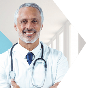 Doctor standing with arms crossed